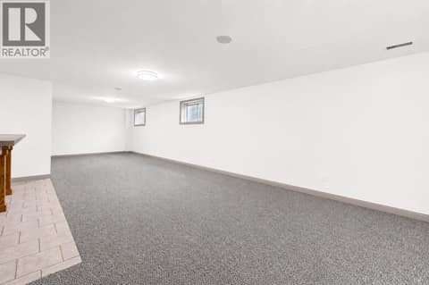 Basement living room at 996 Arlington Court, Brocklehurst, Kamloops