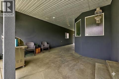 Breeze way to detached shop at 996 Arlington Court, Brocklehurst, Kamloops