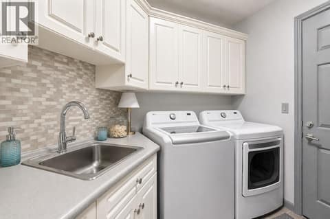 Laundry & access to the garage at 996 Arlington Court, Brocklehurst, Kamloops