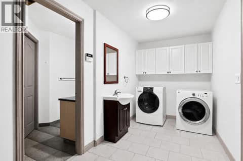 Laundry room downstairs at 996 Arlington Court, Brocklehurst, Kamloops