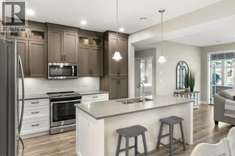 Kitchen with quartz counters at 2450 Radio Tower Road Unit# 70, Oliver Rural