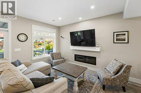 Living room fireplace at 2450 Radio Tower Road Unit# 70, Oliver Rural
