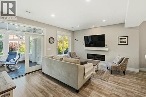 Living room with access to sunroom at 2450 Radio Tower Road Unit# 70, Oliver Rural