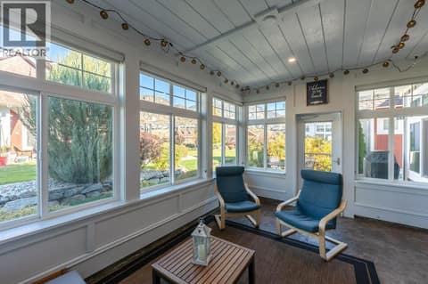 Sunroom and doorway to back patio at 2450 Radio Tower Road Unit# 70, Oliver Rural