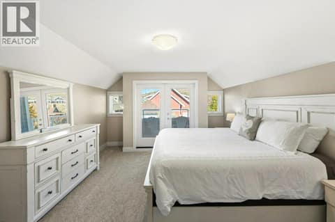 Upper level bedroom with balcony & ensuite at 2450 Radio Tower Road Unit# 70, Oliver Rural