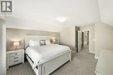 Upper level bedroom with balcony & ensuite at 2450 Radio Tower Road Unit# 70, Oliver Rural