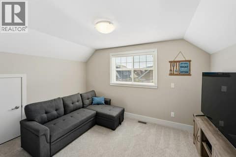 Upper level family room or 6th bedroom at 2450 Radio Tower Road Unit# 70, Oliver Rural