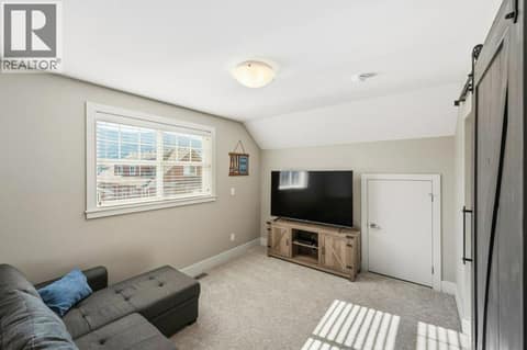Upper level family room or 6th bedroom at 2450 Radio Tower Road Unit# 70, Oliver Rural