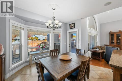 Dining room, patio door to covered deck at 1124 Fairview Road, Oliver