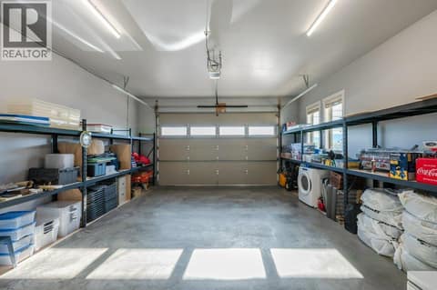 Double Garage with shelving at 1124 Fairview Road, Oliver