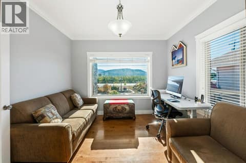 Main level front bedroom/den at 1124 Fairview Road, Oliver