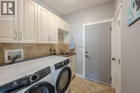 Main level laundry at 1124 Fairview Road, Oliver